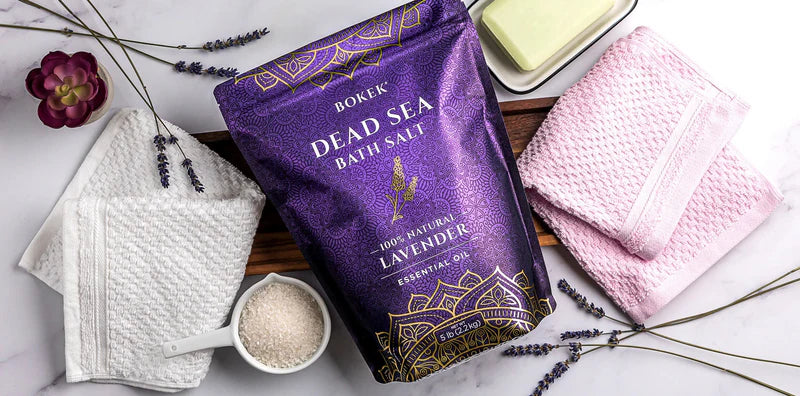 Bokek dead sea salt bag next to lavender and bath towels