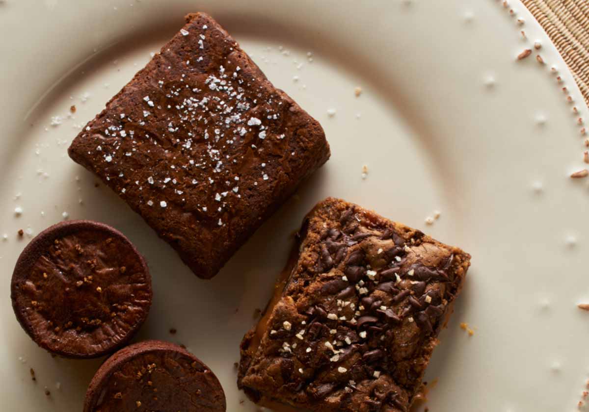 Brownies with sea salt on a white plat