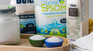 Bokek® and Ultra Epsom® products next to a tray of bath salts