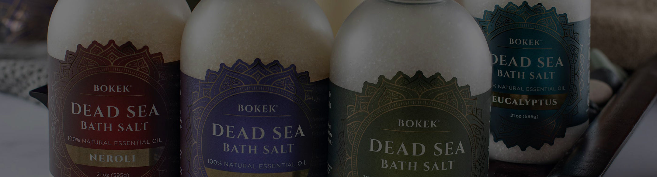 Boker Dead Sea Bath Salt bottles with labels on a blurred background