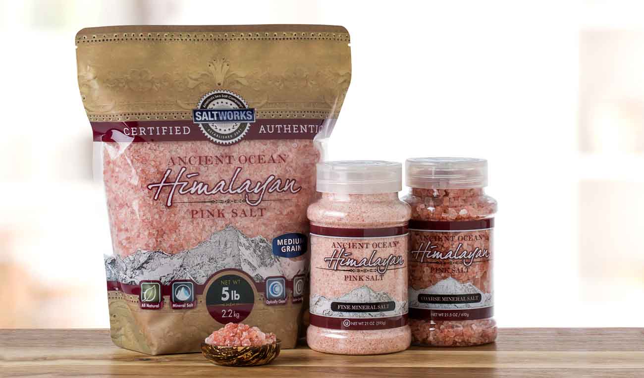 Ancient Ocean Himalayan Salt bags and jars on wooden table